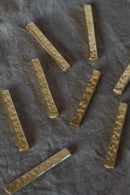 KUMIJI<br>箸置き ＜長円-槌目＞<br>/真鍮<br>reload店 - ヴィンテージ SHARK ATTACK