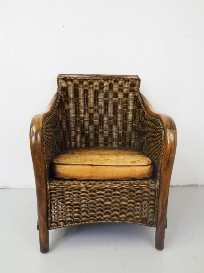 Vintage teakwood x rattan lounge chair Sendagaya store